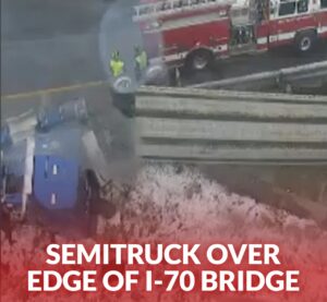 I-70 Semitruck Accident – Truck Dangling Over Bridge Causes Traffic Delays in Jefferson County, Colorado